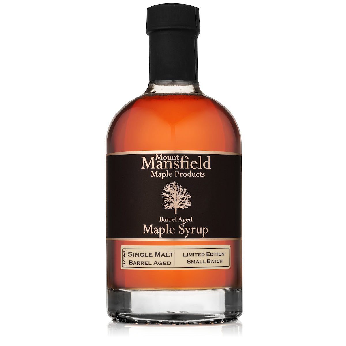 Barrel-aged maple syrup bottle with black cap and Mount Mansfield label