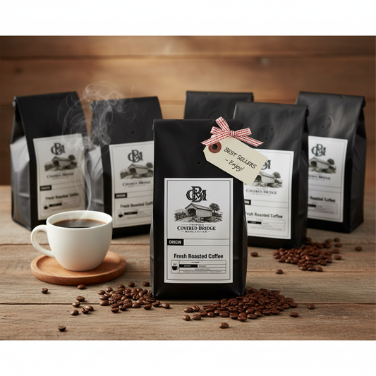 Coffee sample pack with multiple black roasted bags and white cup on wooden table