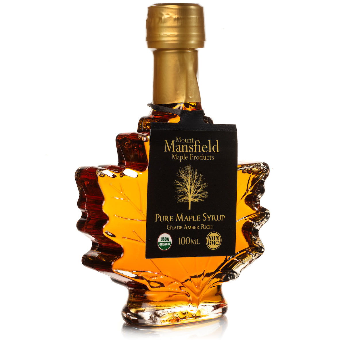 Leaf-shaped pure maple syrup bottle with gold cap and Mount Mansfield label, 100 mL.