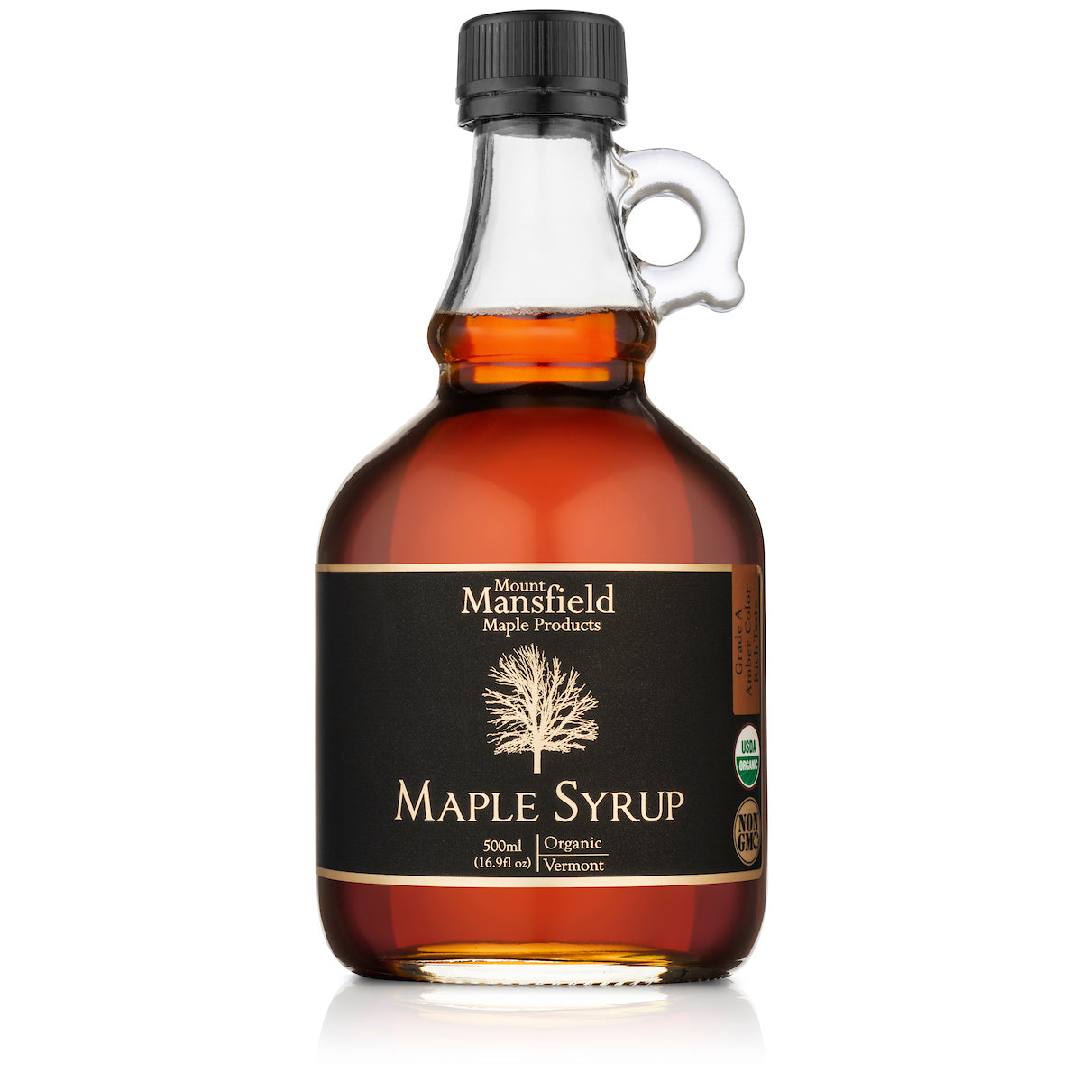 Organic Vermont maple syrup glass bottle with black cap, dark amber syrup and front label