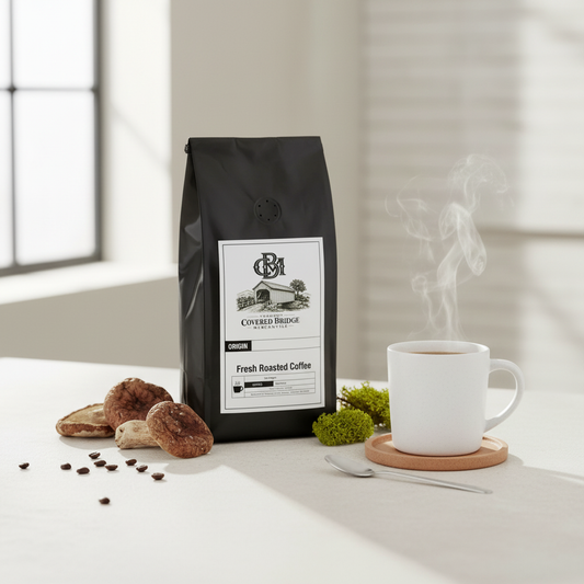 Coffee bag with label, white mug on coaster and coffee grounds
