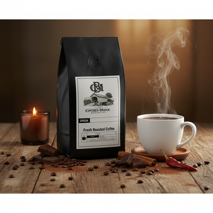 Coffee bag with Covered Bridge label, black pouch with origin and roast details